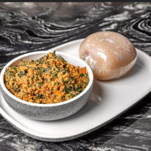 https://chefnchop.com/wp-content/uploads/2025/08/Egusi-soup-with-meat-served-with-eba-garri-fufu-30--300x300.jpg