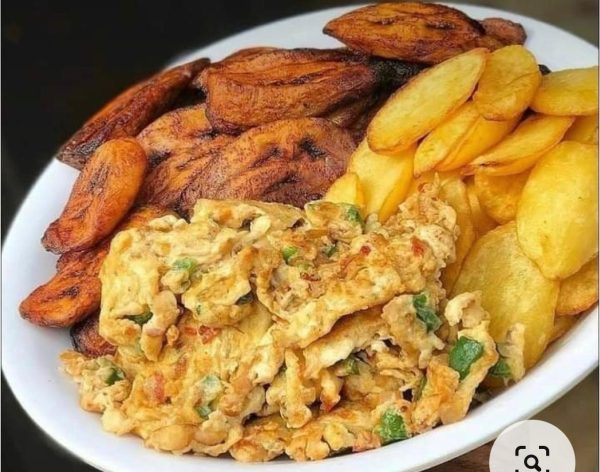 Fried potatoes and plantain with eggs
