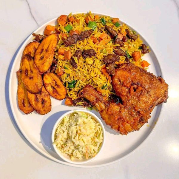 Fried rice, chicken, plantain and coleslaw
