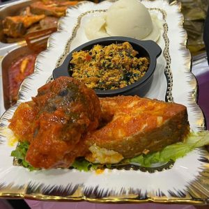https://chefnchop.com/wp-content/uploads/2025/08/Pounded-yam-and-egusi-soup-served-with-fish-or-goat-meat-30--300x300.jpg