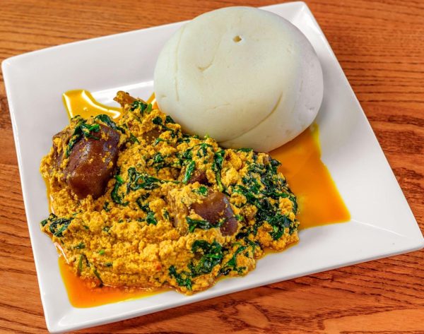 Pounded yam served with eguisi soup and meat