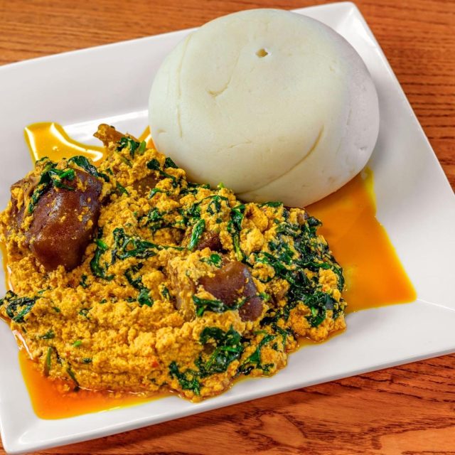 Pounded yam served with eguisi soup and meat